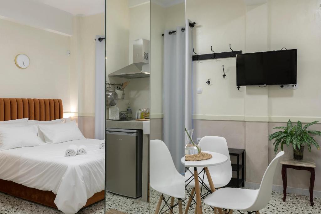Posteľ alebo postele v izbe v ubytovaní Athenian Lofts