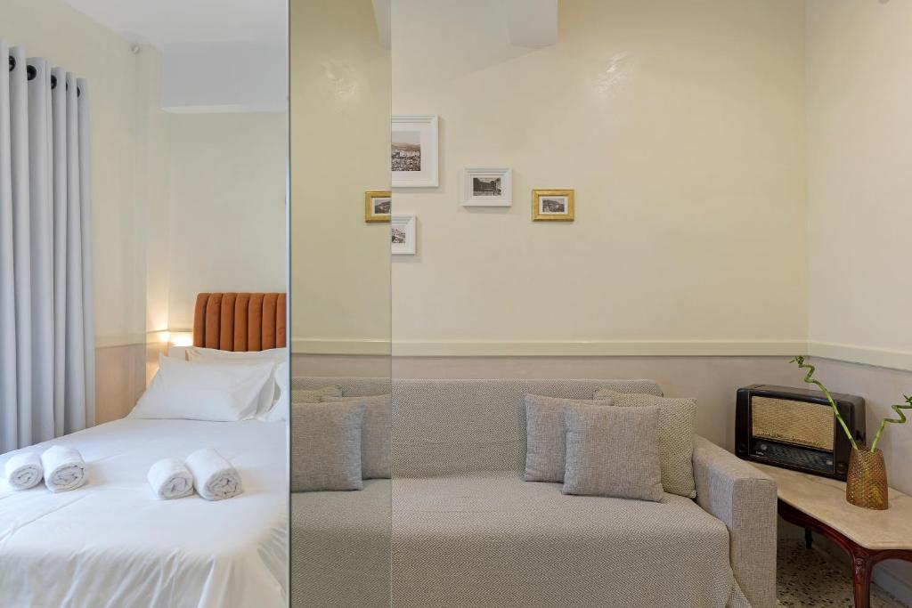 Posteľ alebo postele v izbe v ubytovaní Athenian Lofts