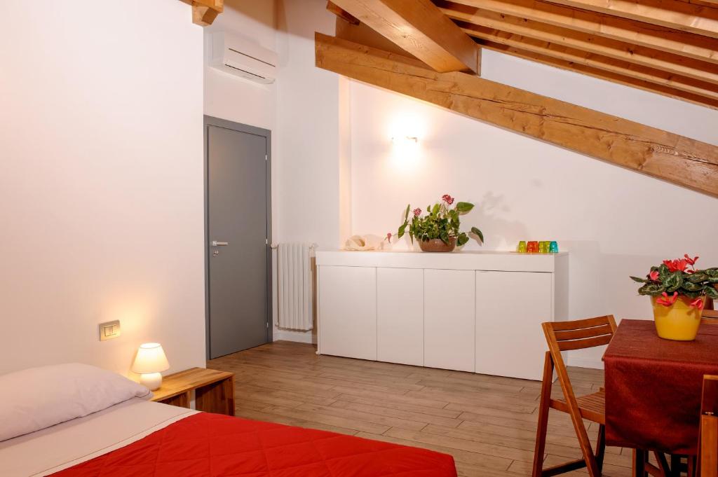 Łóżko lub łóżka w pokoju w obiekcie Tenuta Le Sorgive Agriturismo