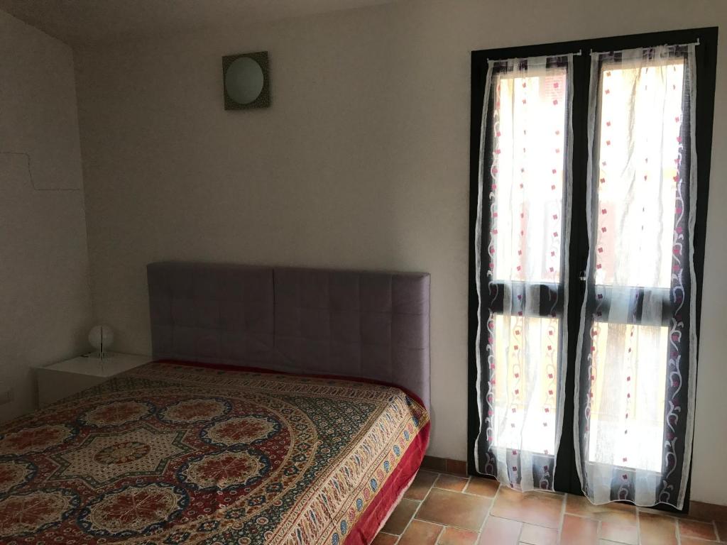 A bed or beds in a room at Li Frati Biancheddi