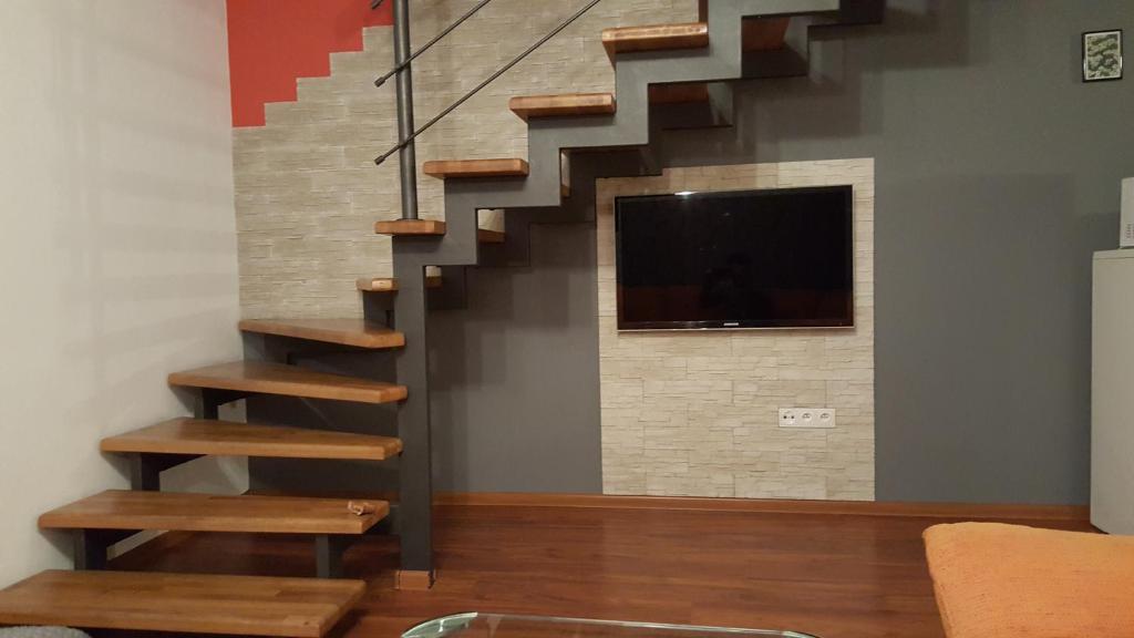 TV a/nebo společenská místnost v ubytování Apartmány u tenisového kurtu