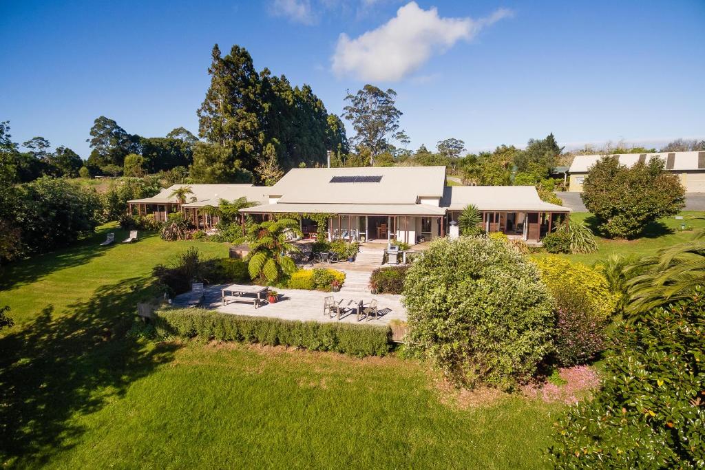 an aerial view of a house with a garden at Puketotara Lodge in Kerikeri
