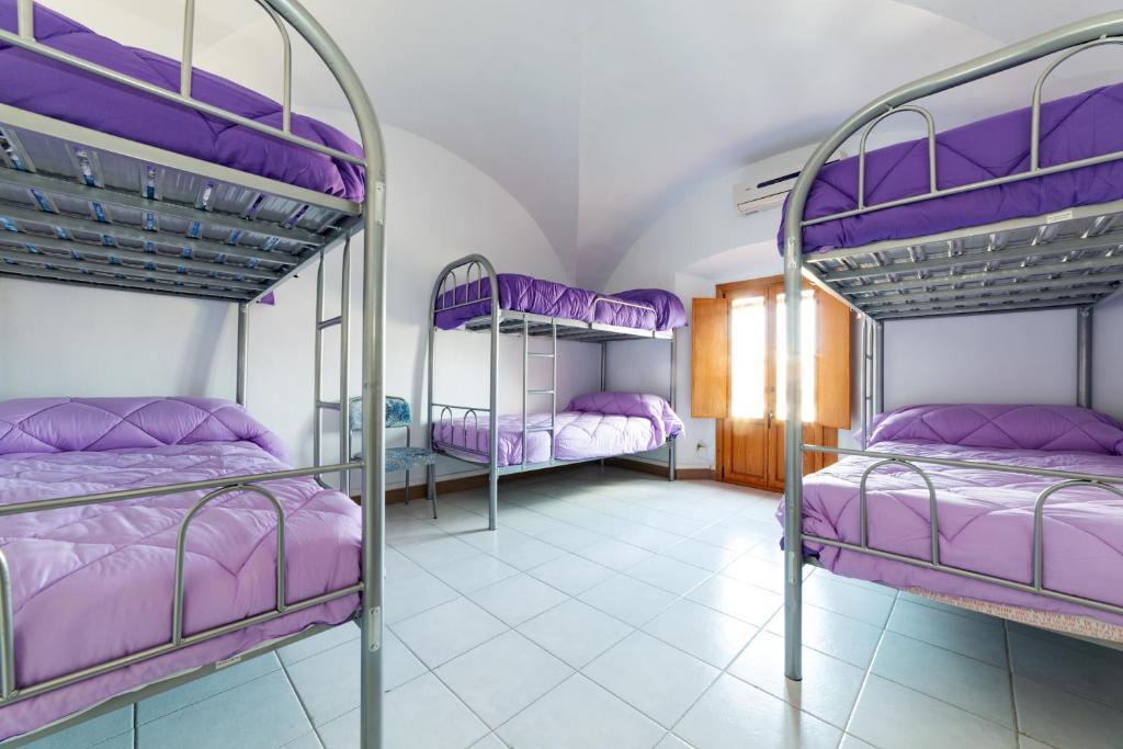 Posteľ alebo postele v izbe v ubytovaní Albergue las Veletas