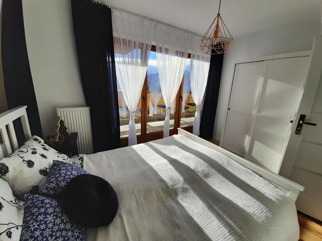Posteľ alebo postele v izbe v ubytovaní Apartament Gaia