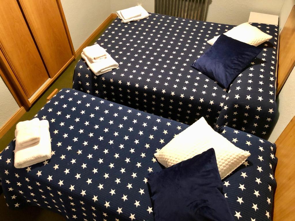 Postel nebo postele na pokoji v ubytování Anayet Sweet Home