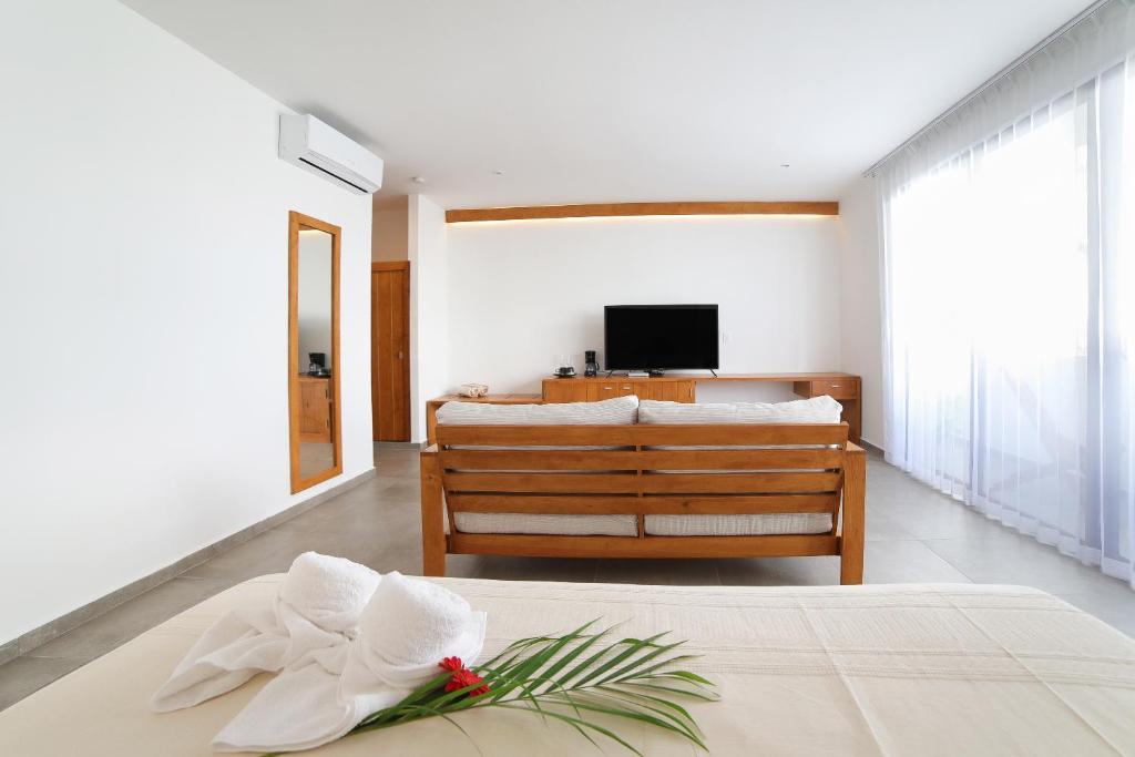 TV a/nebo společenská místnost v ubytování Hotel Blanco Tulum Adults Only