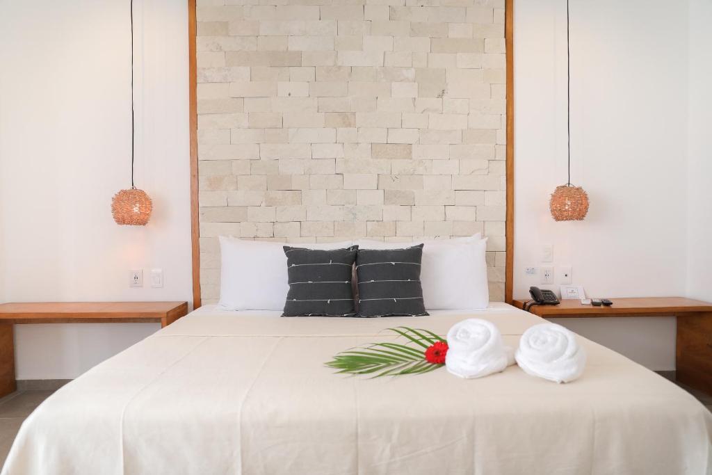 Postel nebo postele na pokoji v ubytování Hotel Blanco Tulum Adults Only