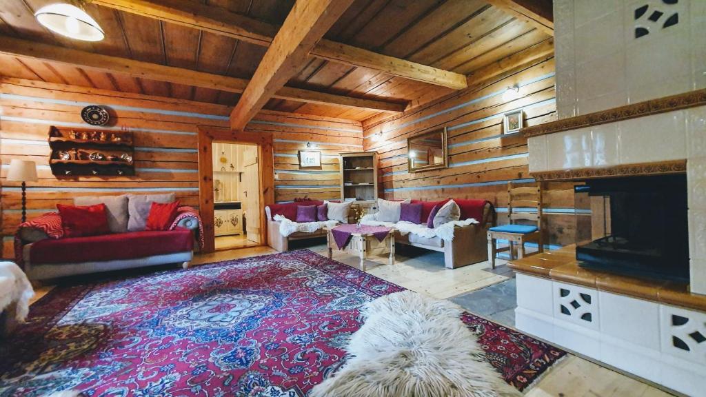 Posezení v ubytování Zdiar Holiday Cottage