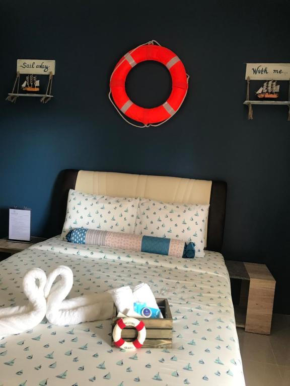 Postel nebo postele na pokoji v ubytování ANCHORAGE INN Moalboal