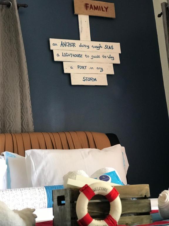 Postel nebo postele na pokoji v ubytování ANCHORAGE INN Moalboal