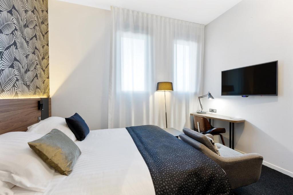 Postel nebo postele na pokoji v ubytování Best Western Plus Europe Hôtel Brest