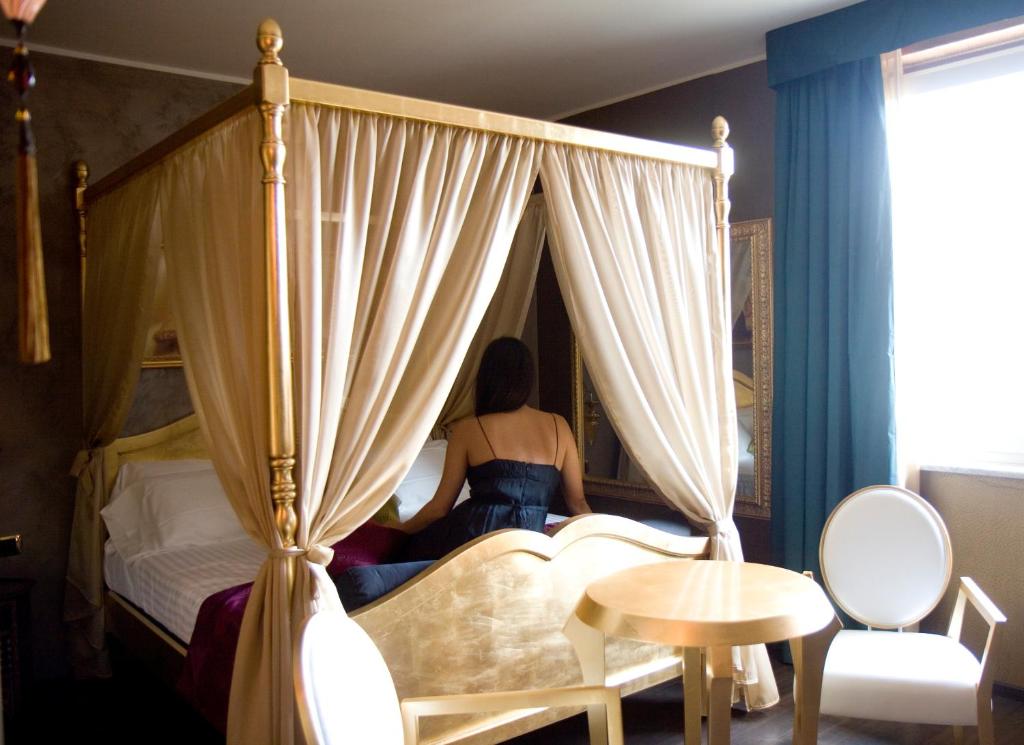 Postel nebo postele na pokoji v ubytování HM MotelHotel