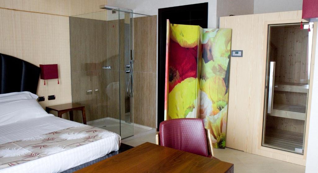 Postel nebo postele na pokoji v ubytování HM MotelHotel