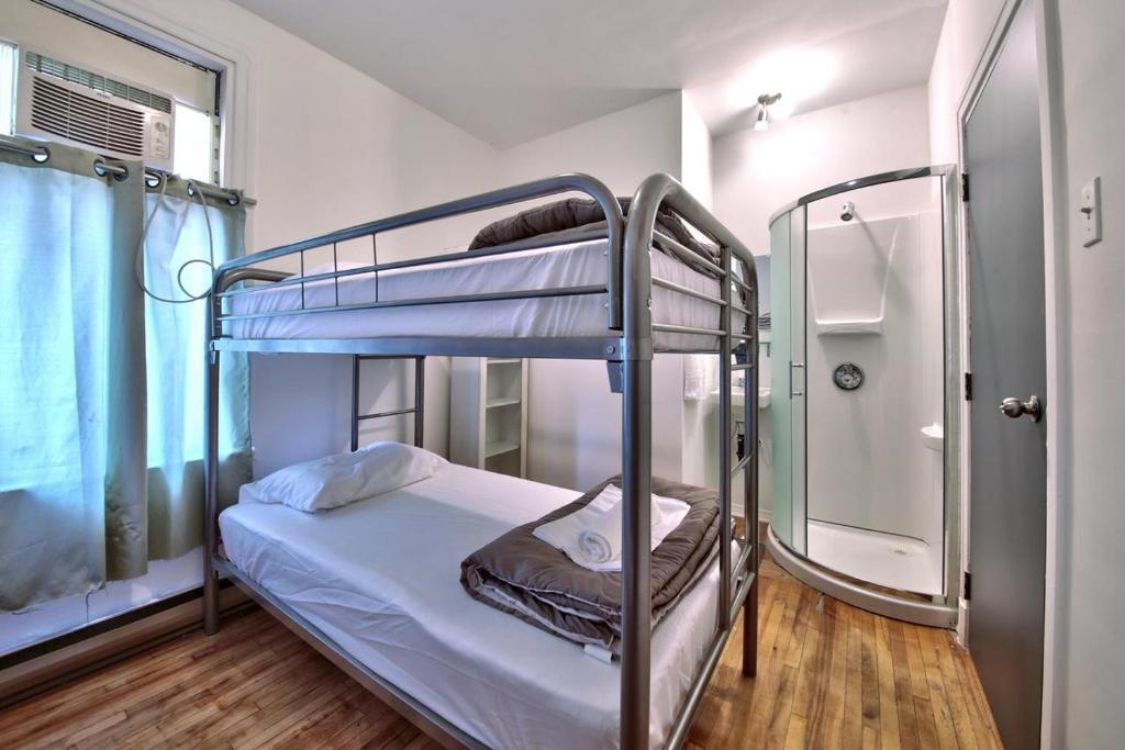 Postel nebo postele na pokoji v ubytování Hotel Mini Inc