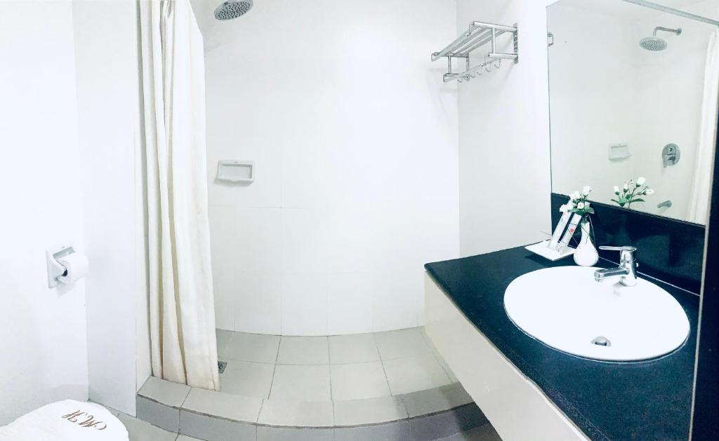Koupelna v ubytování Maharajah Hotel
