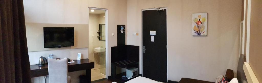 TV a/nebo společenská místnost v ubytování Vio Hotel Cimanuk Bandung