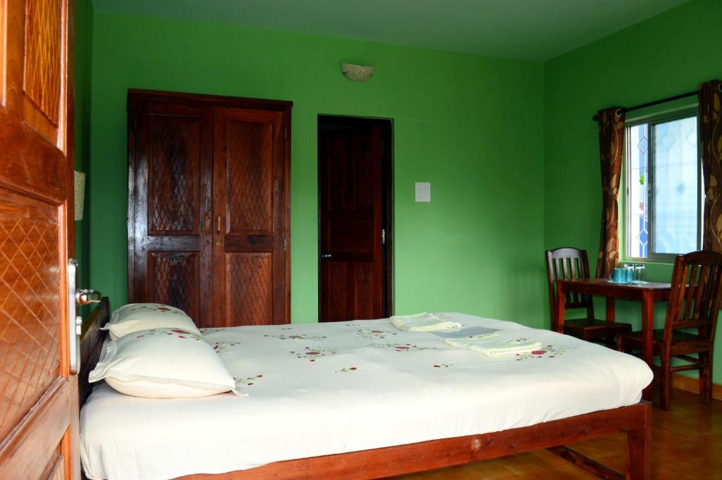 Letto o letti in una camera di Avalon Inn