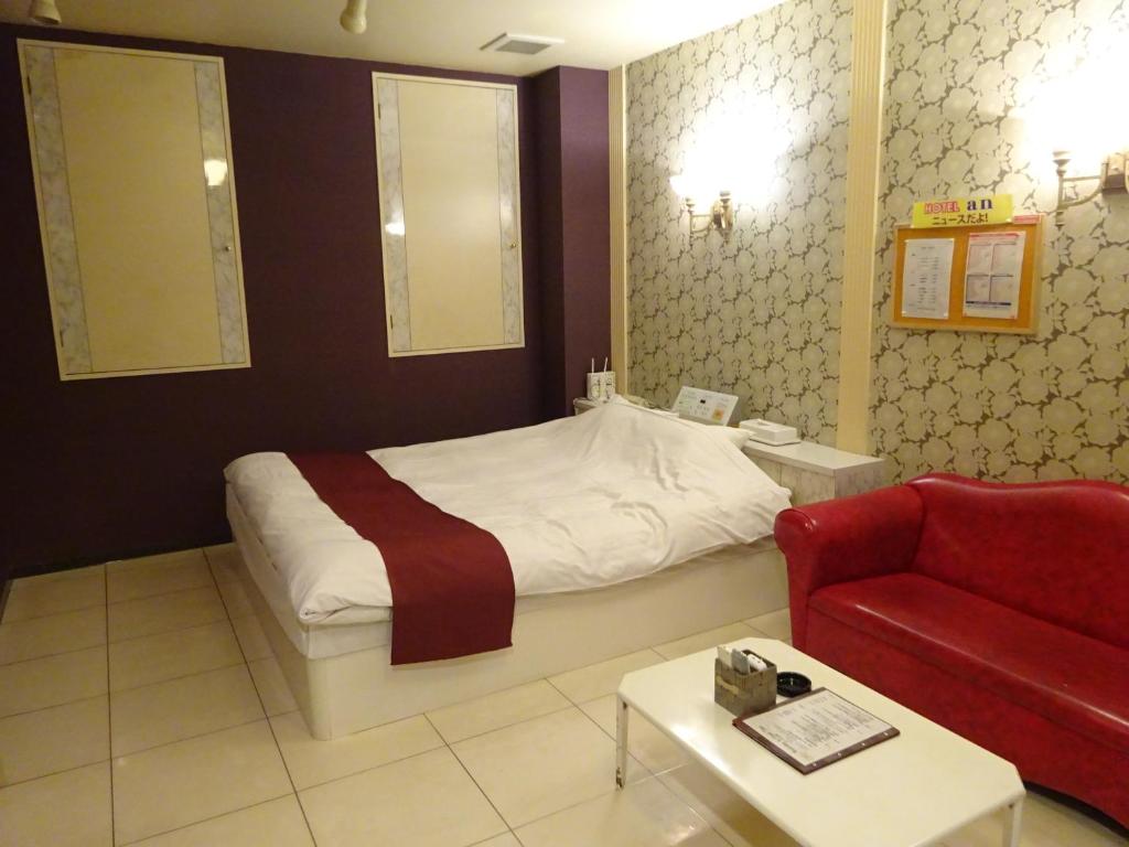 Postel nebo postele na pokoji v ubytování HOTEL Rplus Higashimatsuyama