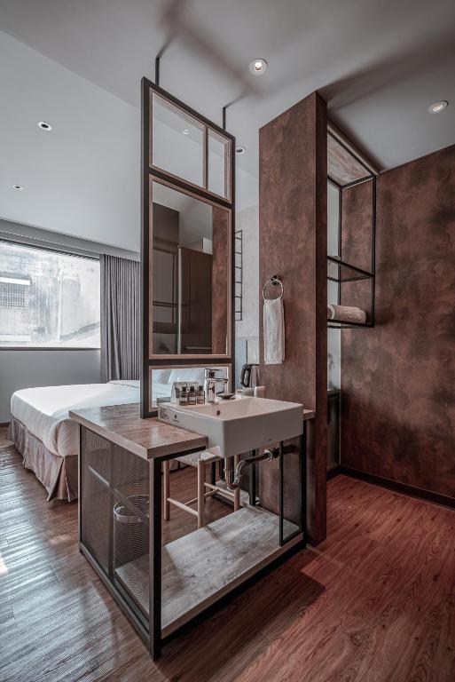 Postel nebo postele na pokoji v ubytování Somer Chew Hotel