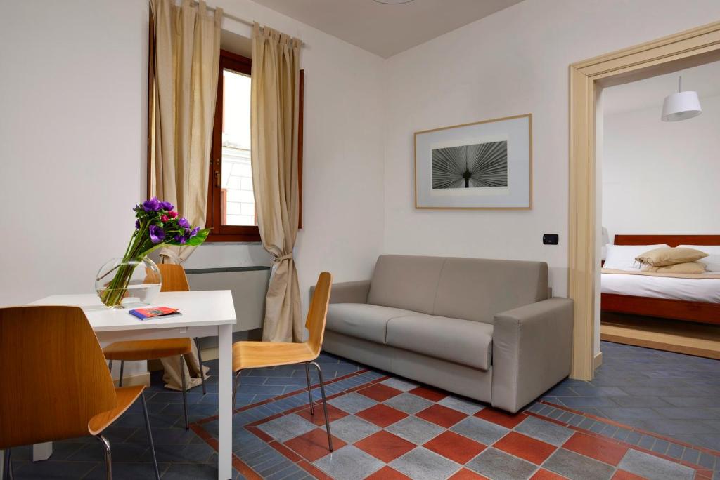 Letto o letti in una camera di Roma Resort Termini