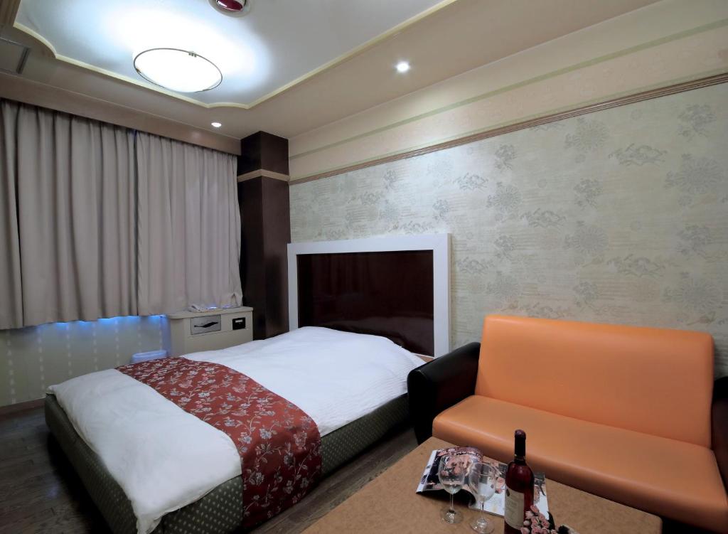 Postel nebo postele na pokoji v ubytování Hotel Mio City (Adult Only)