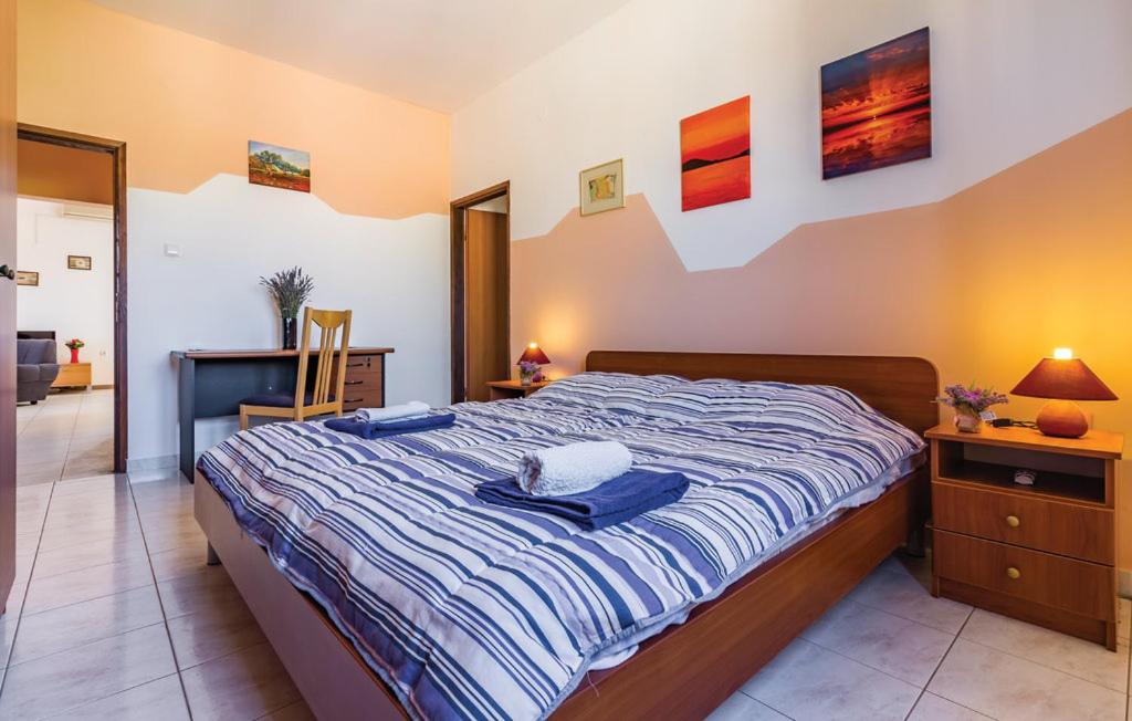 Postel nebo postele na pokoji v ubytování Apartments Branislav 1927