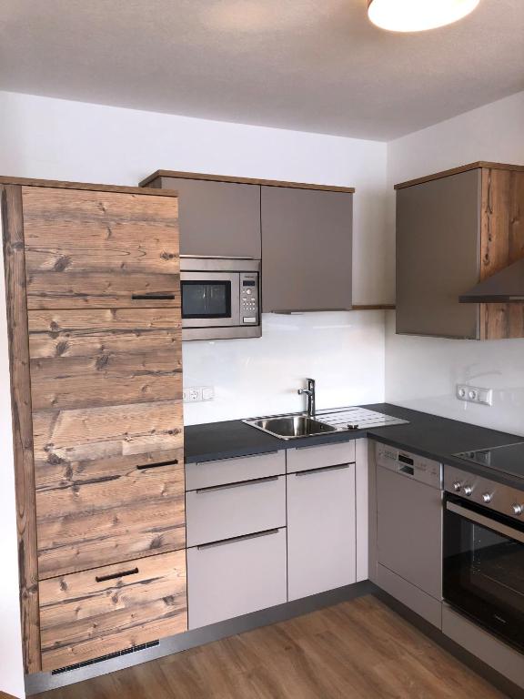 Kuchyň nebo kuchyňský kout v ubytování Ferienappartements Heinzle - Ihr Ferienresort