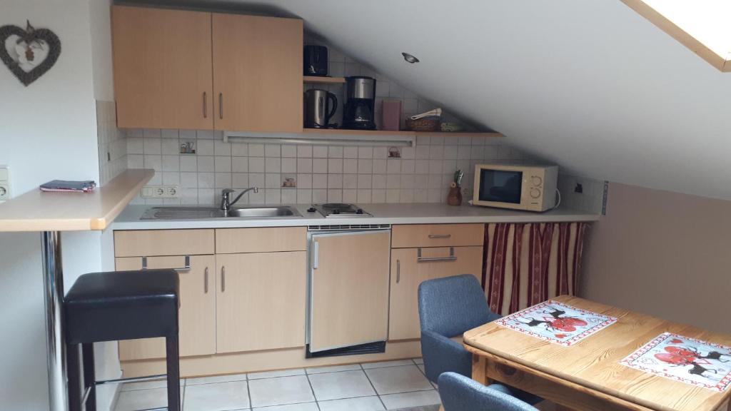 Kuchyň nebo kuchyňský kout v ubytování Gästehaus Pöppl