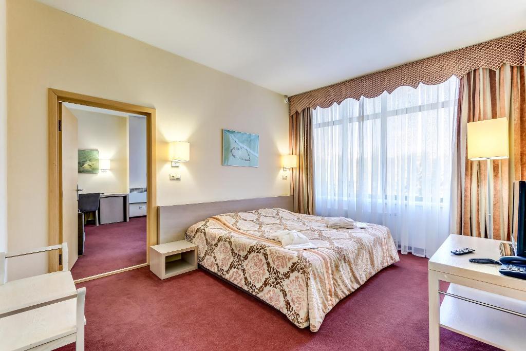 
Кровать или кровати в номере Отель Аквариум

