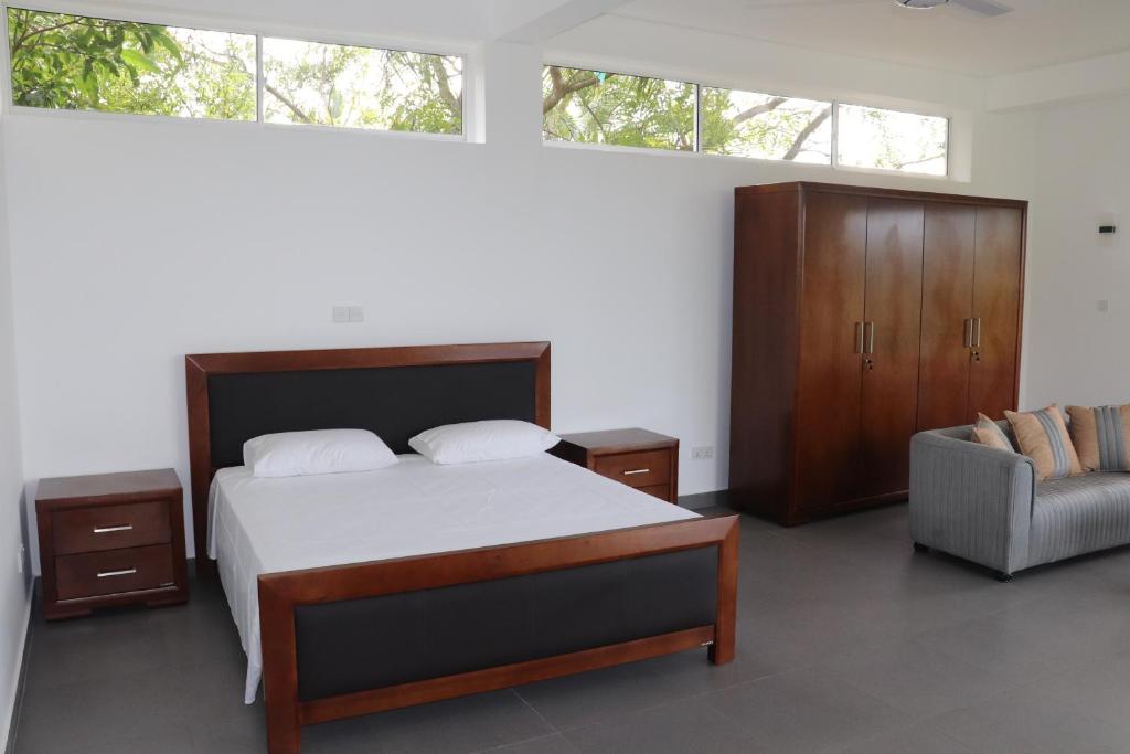 Postel nebo postele na pokoji v ubytování Hotel Paradiso,