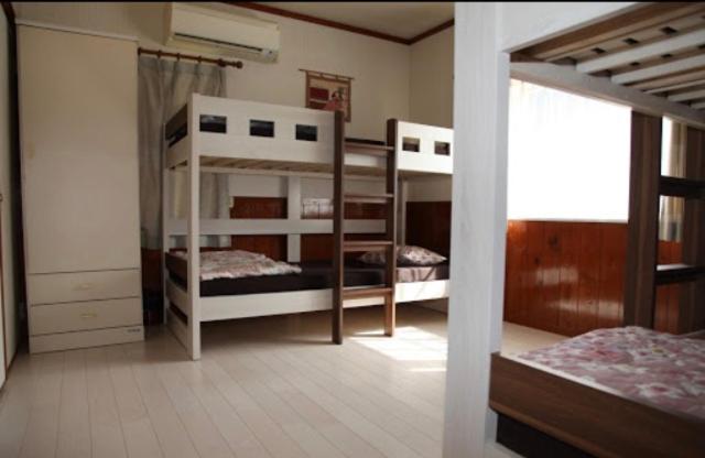 Postel nebo postele na pokoji v ubytování Guesthouse UNILA