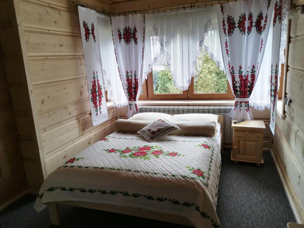 Posteľ alebo postele v izbe v ubytovaní Pokoje gościnne Pod Limbami