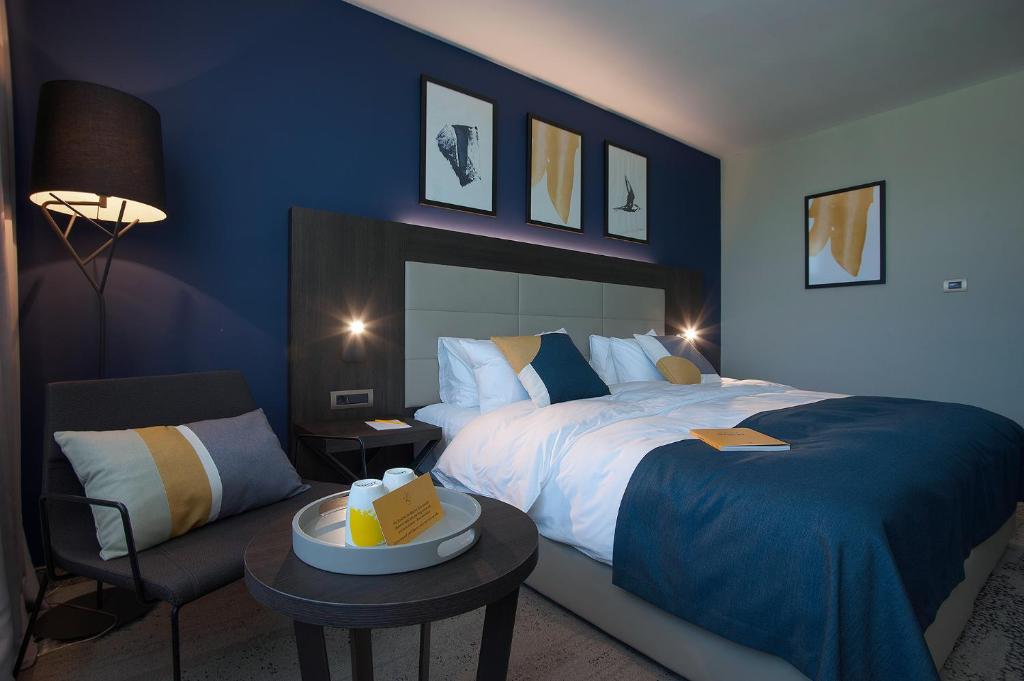 Letto o letti in una camera di voco - Podgorica by IHG