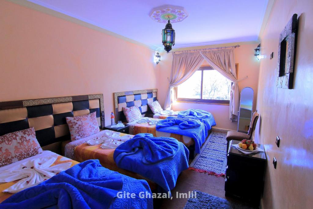 Postel nebo postele na pokoji v ubytování Chez Ghazal Imlil