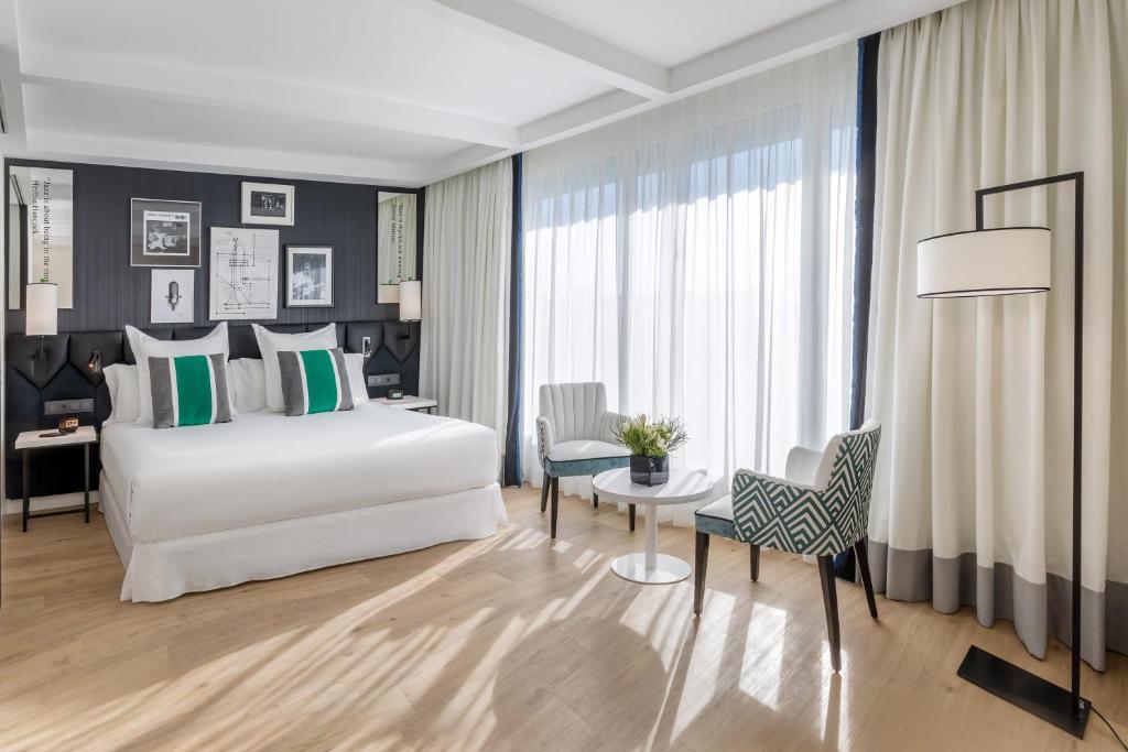 Postel nebo postele na pokoji v ubytování Barceló Imagine