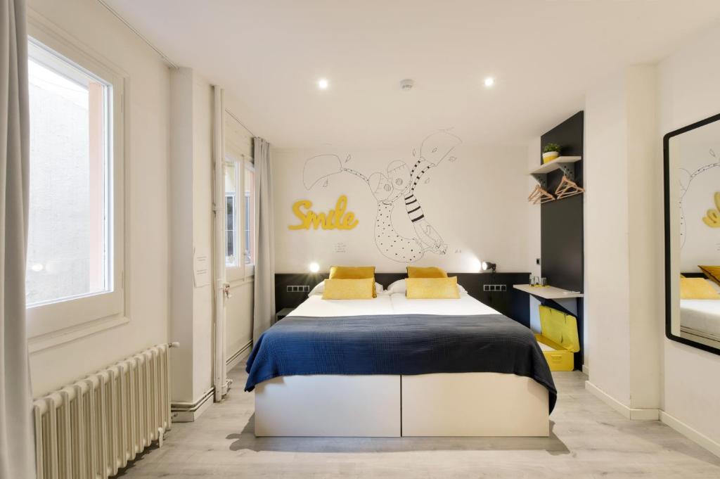 Cama ou camas em um quarto em Free Hostels Barcelona