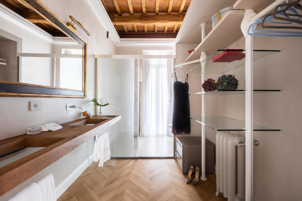 Kuchyň nebo kuchyňský kout v ubytování Poēsis Experience Hotel