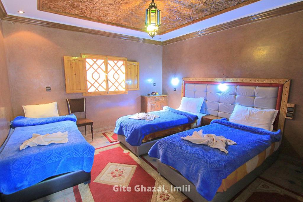 Postel nebo postele na pokoji v ubytování Chez Ghazal Imlil