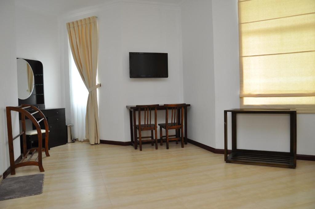 TV a/nebo společenská místnost v ubytování Hotel East Lagoon
