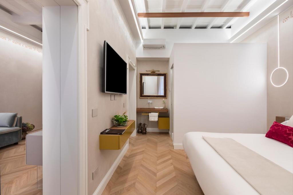 TV a/nebo společenská místnost v ubytování Poēsis Experience Hotel