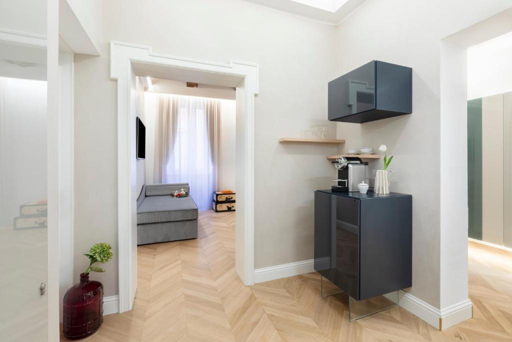 Kuchyň nebo kuchyňský kout v ubytování Poēsis Experience Hotel