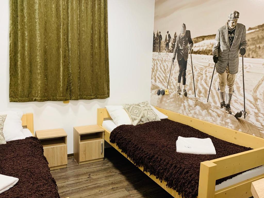 Postel nebo postele na pokoji v ubytování Stodola na Bílé
