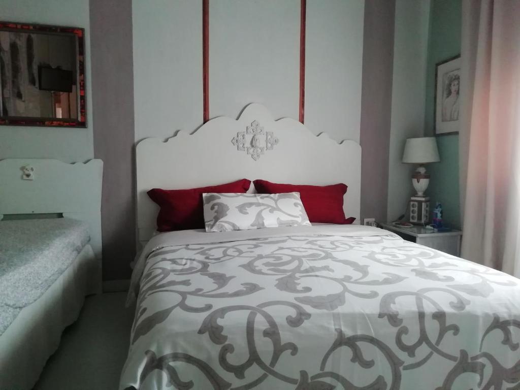 A bed or beds in a room at B&B Art