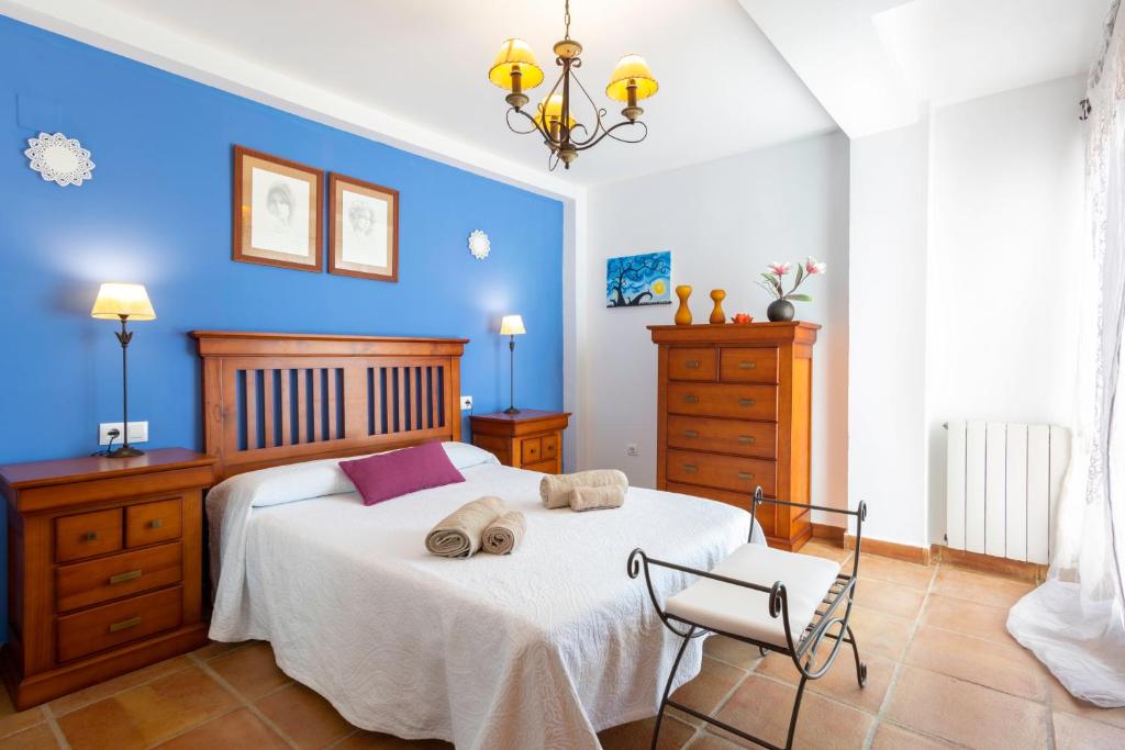 Postel nebo postele na pokoji v ubytování Villa Golf Sanlucar