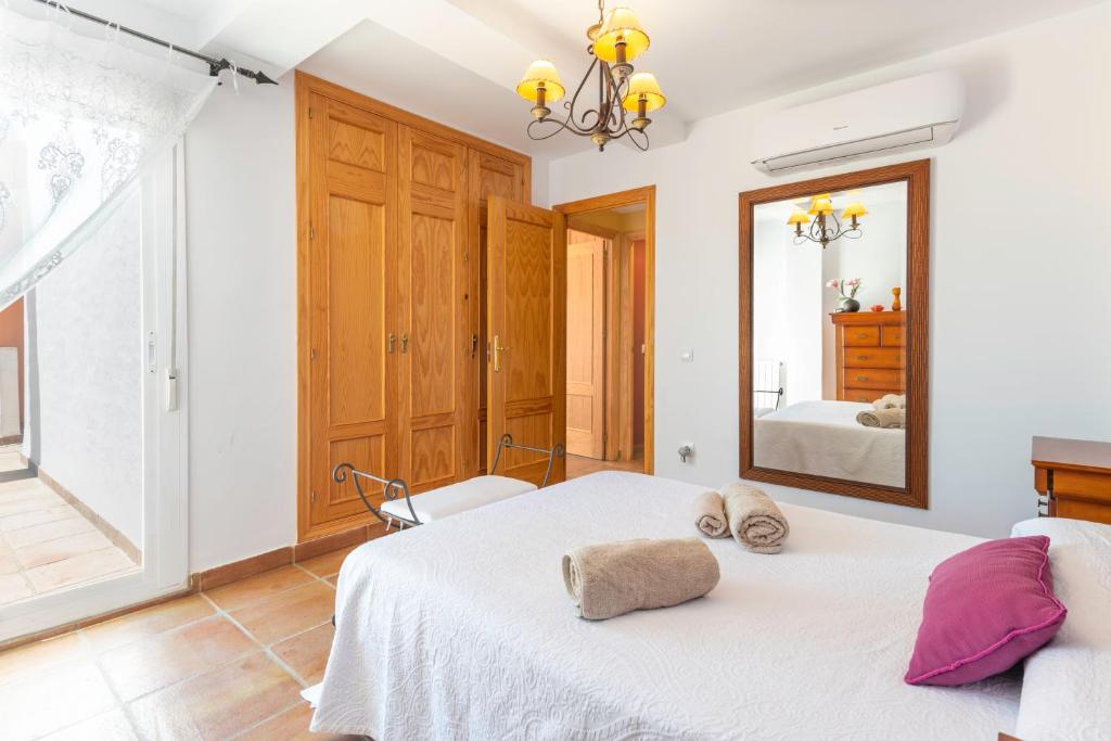 Postel nebo postele na pokoji v ubytování Villa Golf Sanlucar