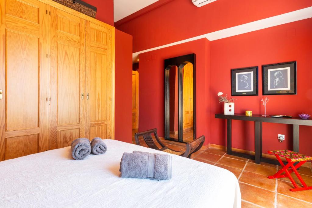 Postel nebo postele na pokoji v ubytování Villa Golf Sanlucar