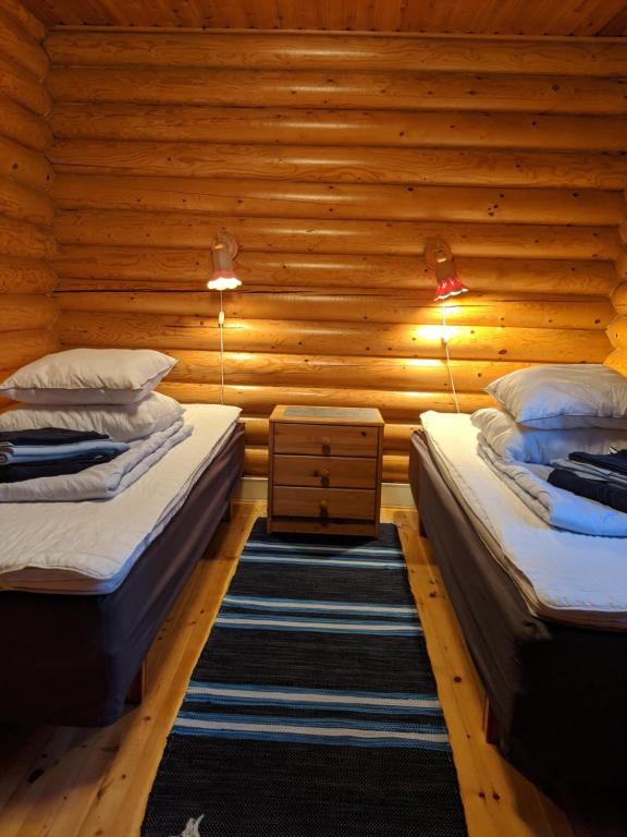 Postel nebo postele na pokoji v ubytování Tunturioravat