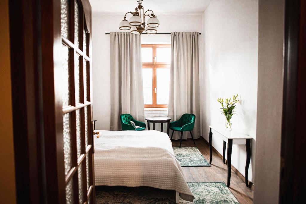 Posteľ alebo postele v izbe v ubytovaní Vilao Apartments