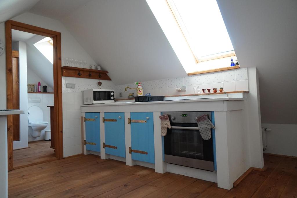 Kuchyň nebo kuchyňský kout v ubytování Apartmán Malšín 2