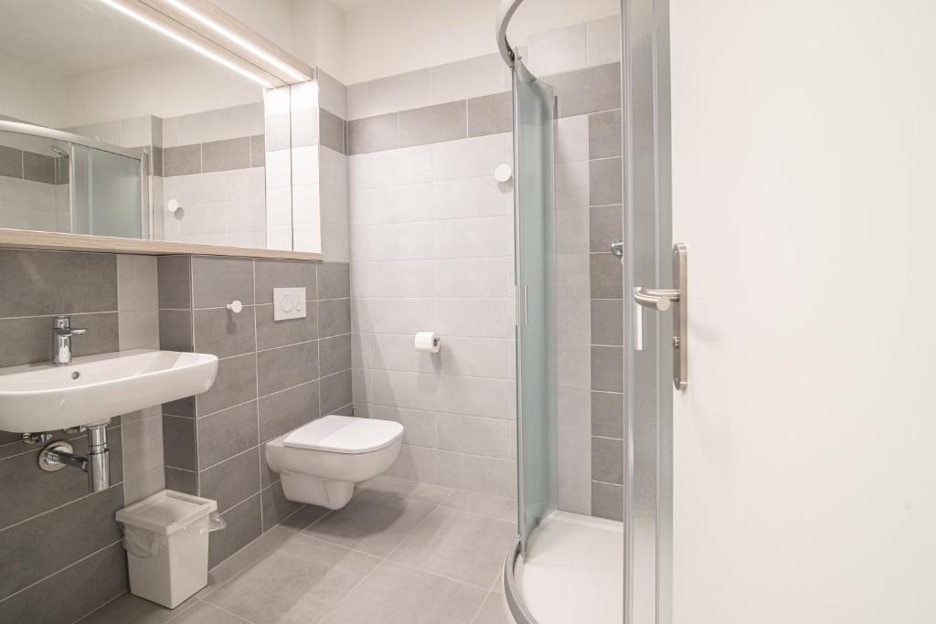 Koupelna v ubytování Garni hotel Roušarka